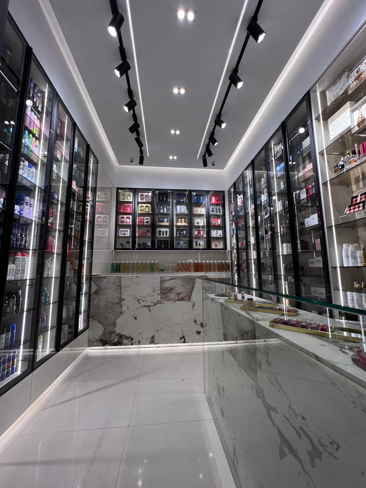 Inside the Parfumerie Masmoudi boutique: shelves of fragrances, makeup and hair care
